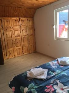 Postel nebo postele na pokoji v ubytování Apartman DoM