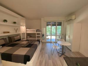 A bed or beds in a room at Bed&breakfast BBqueen Sandonato Policlinico