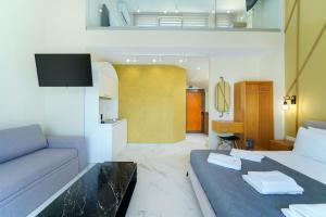 Valen Mare Suites客房内的一张或多张床位