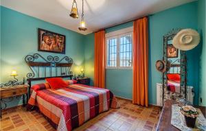A bed or beds in a room at Awesome Home In Montefrío