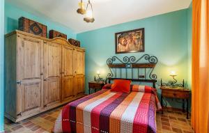 A bed or beds in a room at Awesome Home In Montefrío