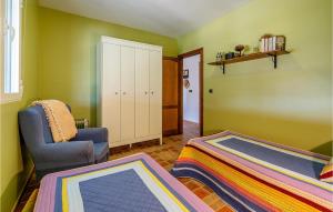 A bed or beds in a room at Awesome Home In Montefrío