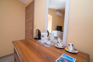 Příslušenství pro přípravu čaje a kávy v ubytování Luisa S2 room B