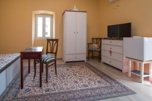 TV a/nebo společenská místnost v ubytování Luisa S2 room B