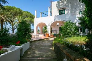 a house with a garden in front of it at Villa in Anacapri