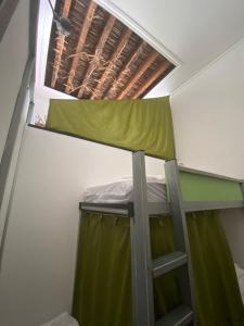 a bunk bed in a room with a window at Tenerife Art Hostel in Santa Cruz de Tenerife