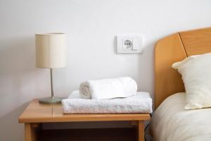 Letto o letti in una camera di JTP Apartmani Ivanjica