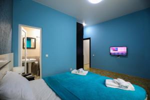 Voodi või voodid majutusasutuse Hotel Sagu toas
