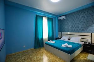 Voodi või voodid majutusasutuse Hotel Sagu toas