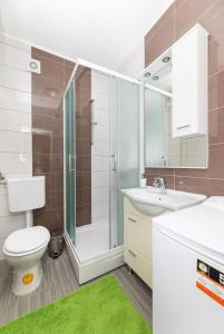 Koupelna v ubytování Apartmani Jašarević