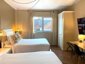 Cama ou camas em um quarto em Magnolia Inn