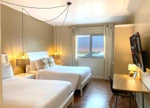 Cama ou camas em um quarto em Magnolia Inn