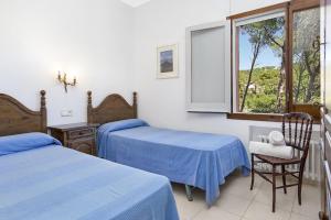 Postel nebo postele na pokoji v ubytování Villa Care 2 - Llafranc + 15 fotografií