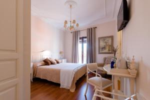 Ένα ή περισσότερα κρεβάτια σε δωμάτιο στο CASA RURAL BOUTIQUE REQUIES 5*