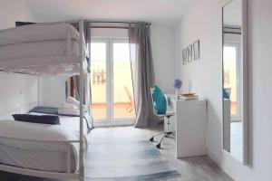 Postel nebo postele na pokoji v ubytování Apartamento Rosalía