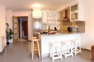 Kuchyň nebo kuchyňský kout v ubytování Apartamento Rosalía