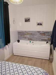 Postel nebo postele na pokoji v ubytování L'ESCALE DETENTE EN VERCORS