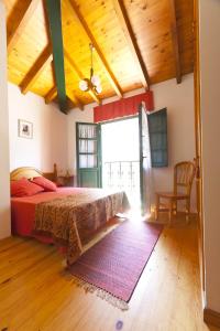Postel nebo postele na pokoji v ubytování Casa Rural Camangu