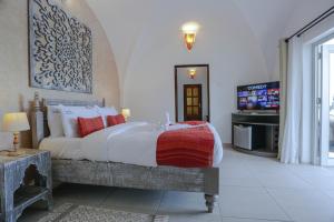 מיטה או מיטות בחדר ב-Mzima Beach Residences - Diani Beach