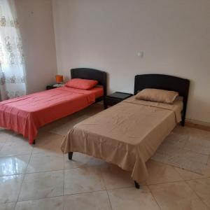 Postel nebo postele na pokoji v ubytování GRAND APPARTEMENT Au calme, ORAN -ALGERIE