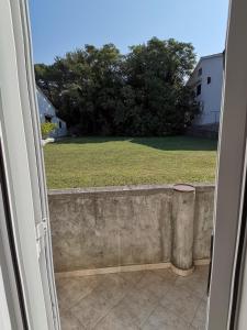 Fotografia z galérie ubytovania Apartmani Škarić v destinácii Lopar