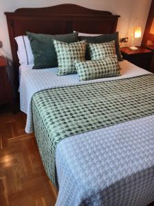 A bed or beds in a room at Sellamante2