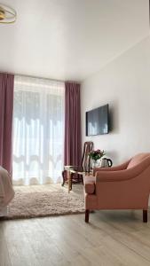 TV a/nebo společenská místnost v ubytování Villa K2