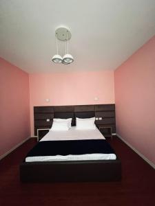 Postel nebo postele na pokoji v ubytování Divjaka Resort