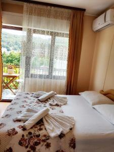 Voodi või voodid majutusasutuse Guesthouse DONA toas