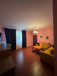 Posezení v ubytování Divjaka Resort