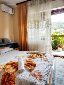Voodi või voodid majutusasutuse Guesthouse DONA toas
