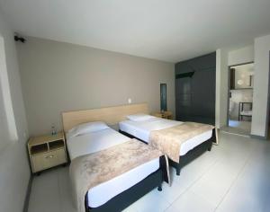 Postel nebo postele na pokoji v ubytování Ayenda 1224 Pixel House