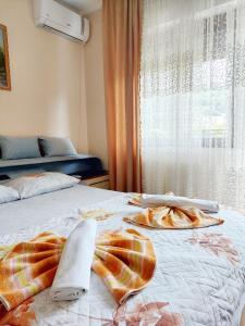 Voodi või voodid majutusasutuse Guesthouse DONA toas
