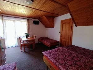 Posteľ alebo postele v izbe v ubytovaní Apartmány 670 pod Lysou horou