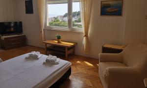 TV a/nebo společenská místnost v ubytování Apartments Žara