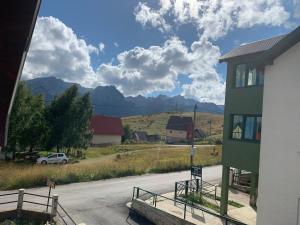 a view of the mountains from a house at Žabljak Getaway Rental in Žabljak