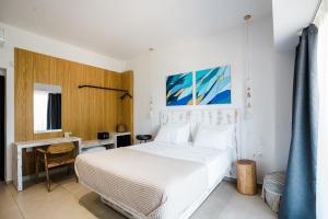 Voodi või voodid majutusasutuse Limna Beach toas