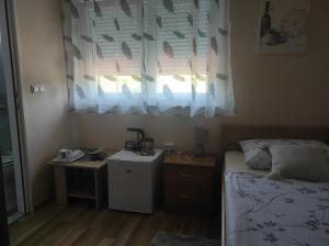Postel nebo postele na pokoji v ubytování Rooms Luka