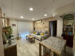Posezení v ubytování Precioso y renovado apartamento cerca de la playa