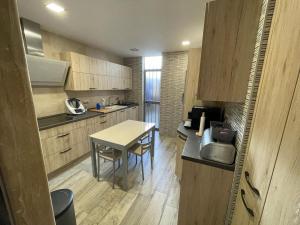 Kuchyň nebo kuchyňský kout v ubytování Precioso y renovado apartamento cerca de la playa
