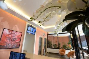 TV a/nebo společenská místnost v ubytování Nest 1 Hotel