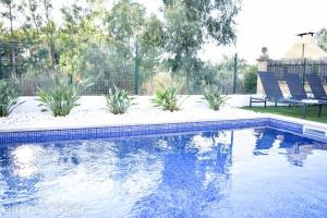 The swimming pool at or close to Villa Can SeQuet (Playa de Muro)