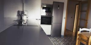 A kitchen or kitchenette at Apartamento Casa A Braña
