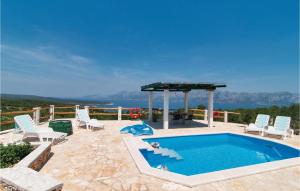 The swimming pool at or close to Beautiful Home In Povlja With 2 Bedrooms, Wifi And Heated Swimming Pool