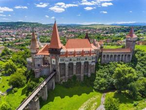 an aerial view of a castle with turrets at Happy place :) in Hunedoara