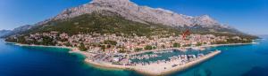 a small island in the middle of the water at Villa Ševo Baška Voda in Baška Voda