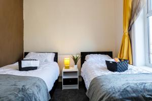 Cama o camas de una habitación en 4 Beds Sleeps 6 - Elegance Leisure Stay, Burnley