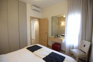 Postel nebo postele na pokoji v ubytování Nest 1 Hotel