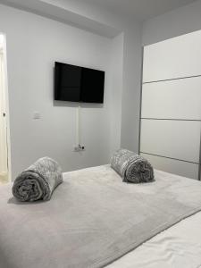Posteľ alebo postele v izbe v ubytovaní Apartamento a 50 metros de la Plaza del Charco, Puerto de la Cruz