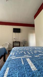Ένα ή περισσότερα κρεβάτια σε δωμάτιο στο Hotel Puerto Selva